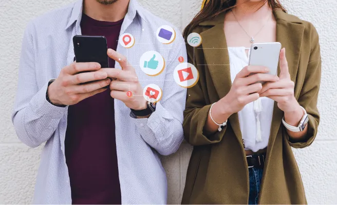 A couple checking their phones side by side